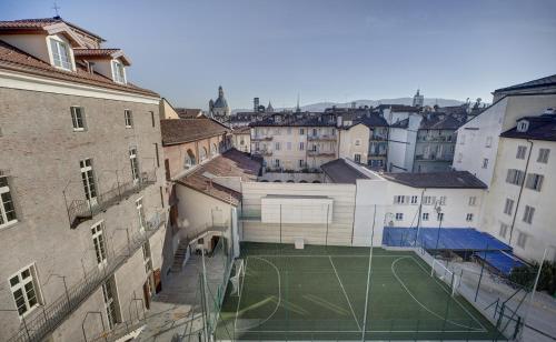 a tennis court in the middle of a city at QUADRATO in Turin