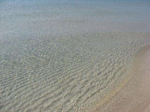 a group of ripples in the sand on a beach at Scialabà Residence Salento in Torre Pali 