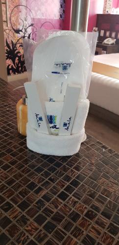 a plastic container sitting on top of a table at Hotel Amala in Mexico City