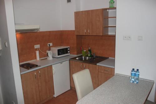 Η κουζίνα ή μικρή κουζίνα στο Apartamenty Twoje Mikołajki