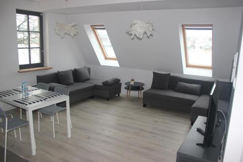 Χώρος καθιστικού στο Apartamenty Twoje Mikołajki
