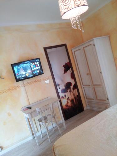 Μια τηλεόραση ή/και κέντρο ψυχαγωγίας στο Hotel Eva La Romantica