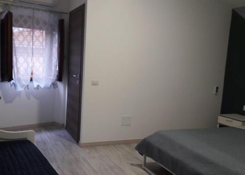 Postel nebo postele na pokoji v ubytování Sa domu rubia
