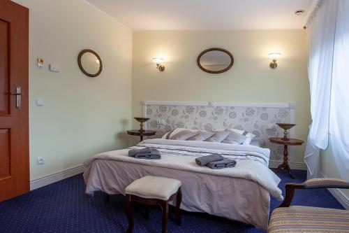 Postel nebo postele na pokoji v ubytování Napoleoński