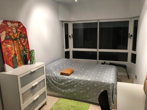 Кровать или кровати в номере centro / internet / parking / aire acondicionado