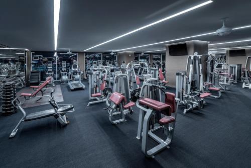 a gym with a bunch of machines in it at Palms Place Hotel and Spa in Las Vegas