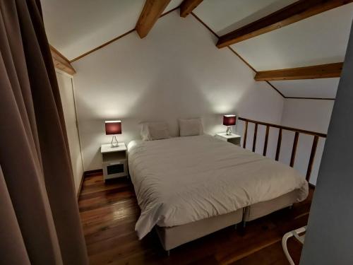Postel nebo postele na pokoji v ubytování Apartamentos da Galé