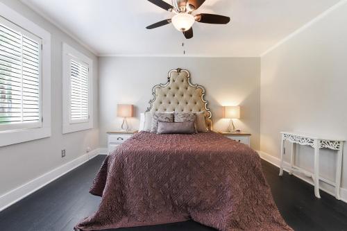 a bedroom with a bed and a ceiling fan at T'Frere's Bed & Breakfast in Lafayette