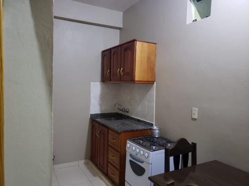 Kuchyň nebo kuchyňský kout v ubytování Class Apart Hotel