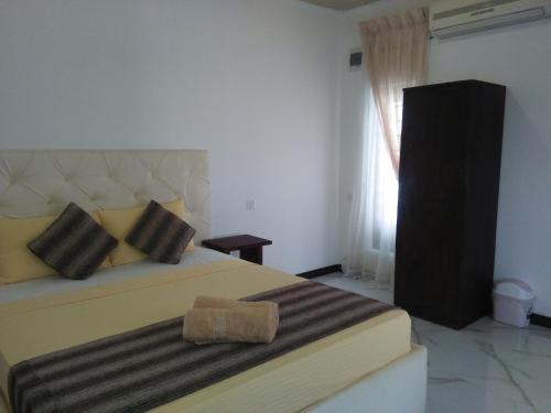 Postel nebo postele na pokoji v ubytování Living Home