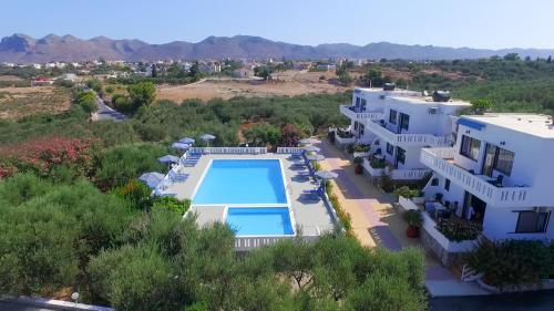 an aerial view of a villa with a swimming pool at Villas Michalis in Chorafakia