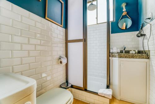 a bathroom with a toilet and a sink at Selina La Paz in La Paz