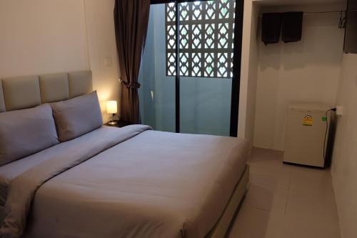 Cama o camas de una habitación en Minimal House Patong
