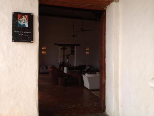 an open door to a room with a living room at Portal de la Marquesa in Mompos