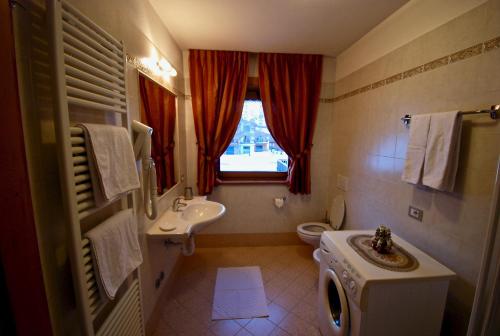 Et badeværelse på Appartamenti Sport 3000