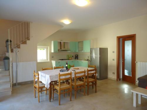 Kuchyň nebo kuchyňský kout v ubytování Villa Ninfea