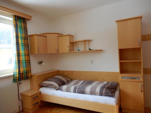 Postel nebo postele na pokoji v ubytování Ferienhaus Grohs