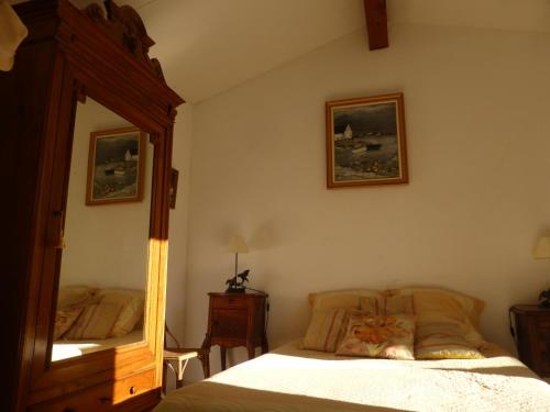 Tempat tidur dalam kamar di 4SAP22 Appartement climatisé avec double terrasses