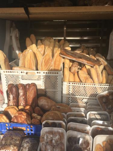 a bakery with lots of different types of bread at El Amparo in Alhama de Granada