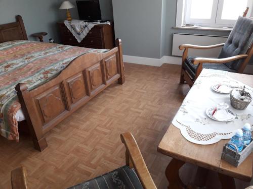 Postel nebo postele na pokoji v ubytování B&B Mussenzele