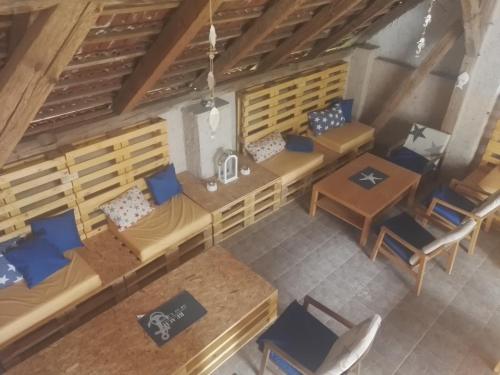 an overhead view of a restaurant with tables and chairs at Penzion u lípy in Jestřebí