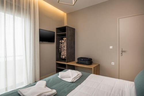 Postel nebo postele na pokoji v ubytování Mirma Luxury Apartment
