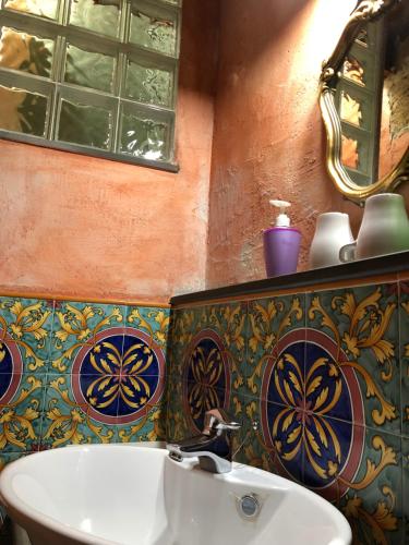 Ein Badezimmer in der Unterkunft Aigua