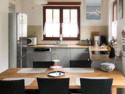 Kuchyň nebo kuchyňský kout v ubytování Haus am Meer