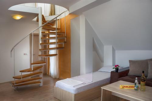 Ένα ή περισσότερα κρεβάτια σε δωμάτιο στο Vanilla Garden Apartments