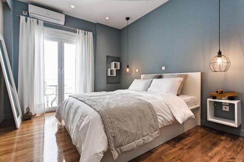 Ένα ή περισσότερα κρεβάτια σε δωμάτιο στο Modern Design Acropolis Flat