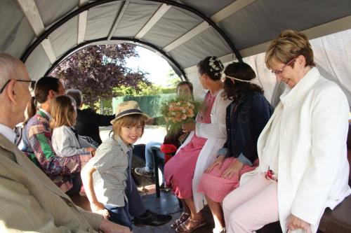a group of people sitting in a tent at B&B Cambiare in Eeklo