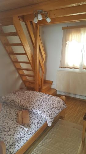 Postel nebo postele na pokoji v ubytování Pansion i Restoran ,, POGLED"