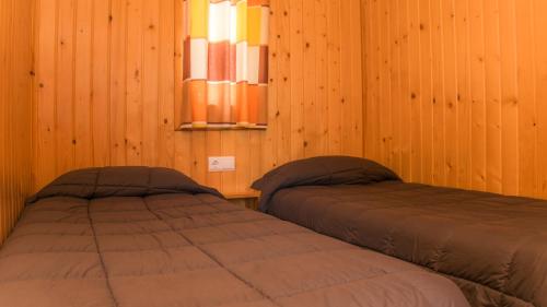 Postel nebo postele na pokoji v ubytování Camping Ametlla