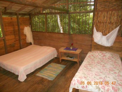 Una cama o camas en una habitación de Posada Villamaga