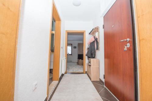 a hallway with a door leading into a room at Apartment Hobbit - Bjelašnica in Bjelašnica