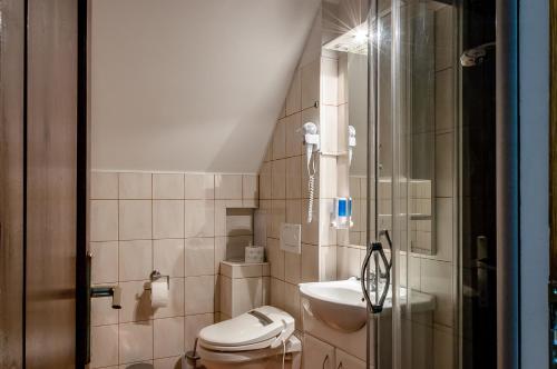 Kúpeľňa v ubytovaní Bástya Hotel