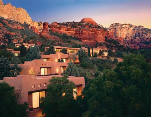 a house in front of a mountain at dusk at Enchantment in Sedona