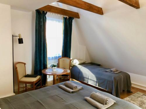 Кровать или кровати в номере Bielski Guesthouse