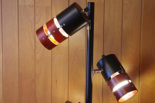 a black telescope attached to a wooden wall at Villent Kujukuri Arrow in Kujukuri