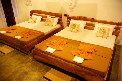 Cama o camas de una habitación en Hasthi Safari Cottage