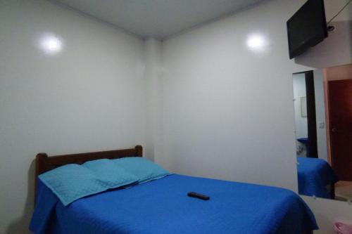 Katil atau katil-katil dalam bilik di Hotel La Avenida