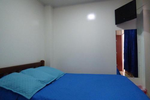 Katil atau katil-katil dalam bilik di Hotel La Avenida