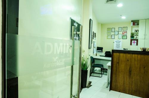 an office with a sign that reads dminkential at Dreamwave Hotel Santiago in Santiago City