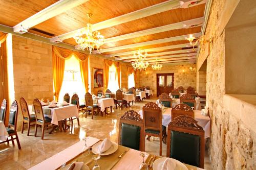 Restorāns vai citas vietas, kur ieturēt maltīti, naktsmītnē Izala Boutique Hotel