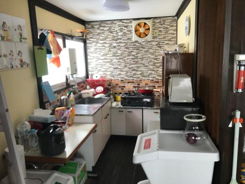 Кухня или мини-кухня в Naeba Ski Resort - Cottage away from usual life
