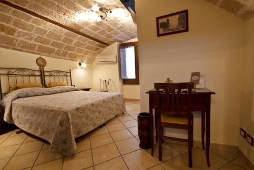 A bed or beds in a room at B&B Casa Cimino - Monopoli - Puglia
