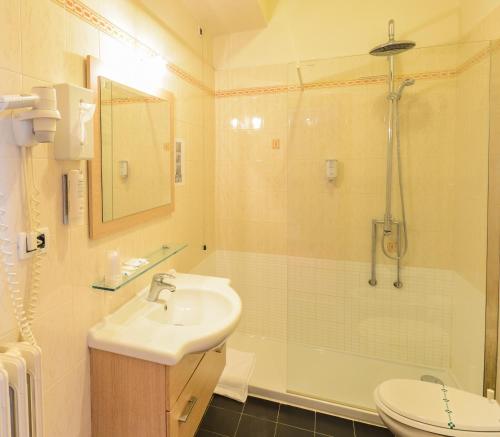 Ett badrum på Hotel Suisse