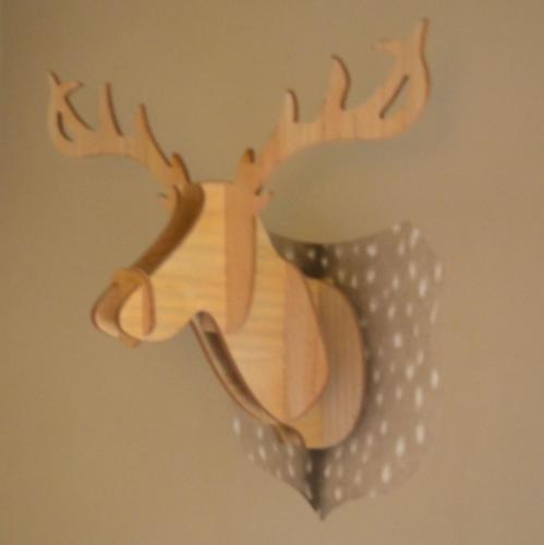 a reflection of a reindeer on a wall at Hôtel Vauban in Belfort
