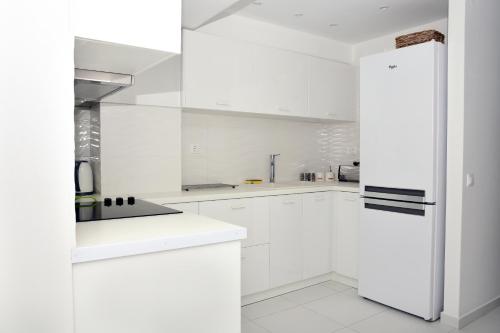Photo de la galerie de l'établissement Adikri Villas & Suites, à Tourlos