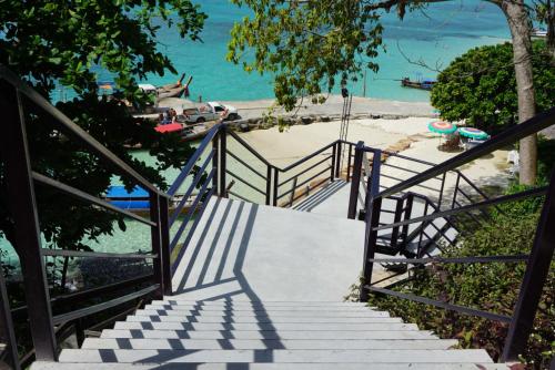 a row of wooden stairs leading up to a balcony at HIP Seaview Resort @ Phi Phi in Phi Phi Islands